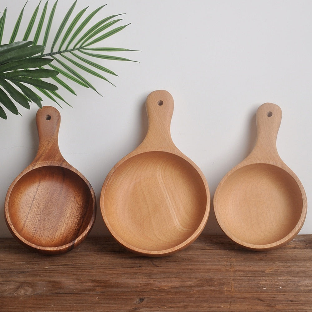 2 Wooden Sauce Dishes side by side