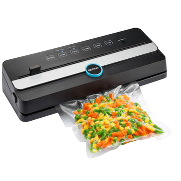 Automatic Vacuum Sealer sealing a bag of chopped carrots, peas and corn